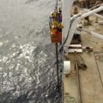 Taking sediment cores for coral dating (c) M. Douarin