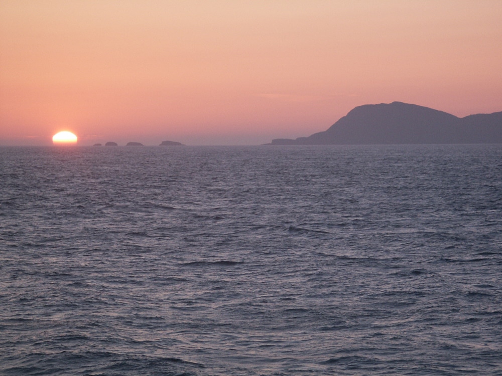 Sun sets to the west of the Outer Hebrides