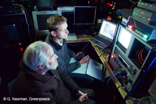 Scientists watch the video output from a video rig, Mingulay Reef, NE Atlantic. © G. Newman (2005)