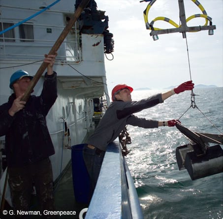 A primed video-assisted grab is lowered into the Mingulay Reef Complex © G. Newman (2005)